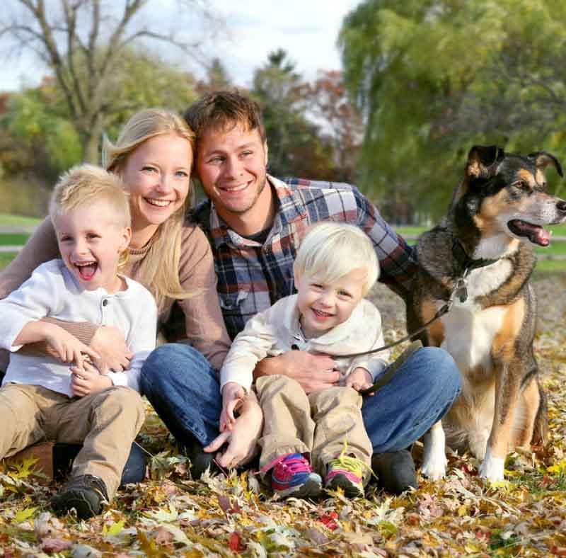 happy family with dog in nature-small happy family-heatlh-dr christine sauer omega-3 index fish oil food nutrition supplements
